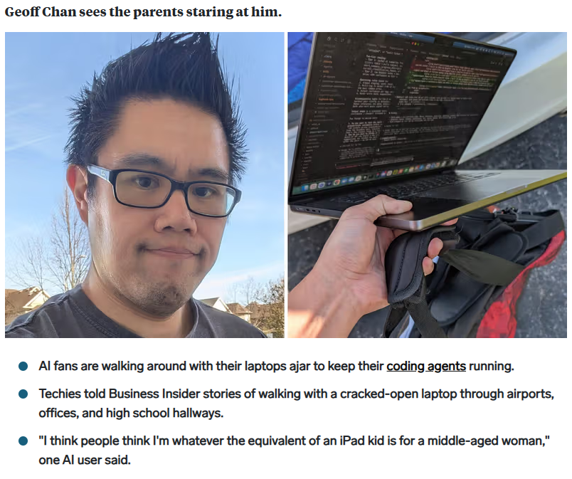 Developers holding a laptop open